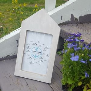 Distressed wood beach house frame
